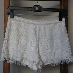 White & Black pair of lace shorts